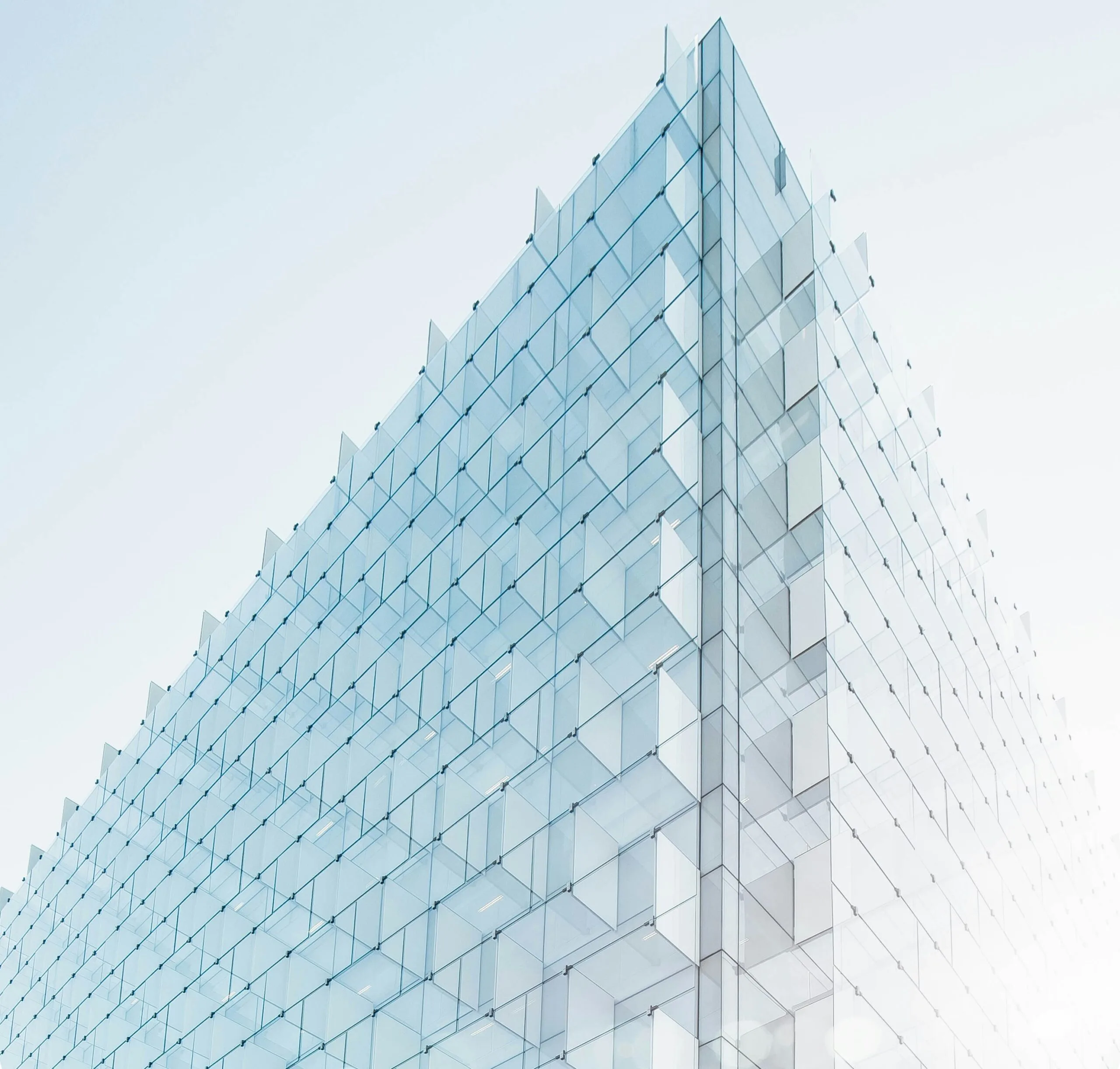 glass building under clear blue sky